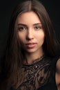 Closeup beauty portrait of a young sensual beautiful brunette girl with long black straight flying hair Royalty Free Stock Photo