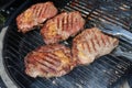 Closeup of a beef steak on the grill Royalty Free Stock Photo