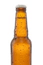 Closeup Beer bottle with water drops isolated on white