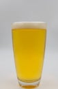 Closeup beer in glass on white background