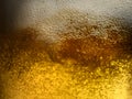 Closeup beer pour with frothy head and bubbles Royalty Free Stock Photo