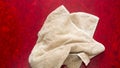 Closeup of beige towel lying on floor Royalty Free Stock Photo