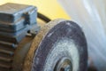 Closeup of bench grinder old wheel