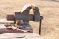 A closeup of the bench vise in the wooden mechanical workshop Royalty Free Stock Photo