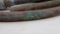 A Closeup on a Bend in an Old Copper Pipe Royalty Free Stock Photo