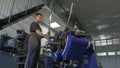 Closeup Bending Machine Makes Metal Ring Worker Holds Part