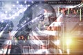 Closeup Benjamin Franklin face on USD banknote with stock market chart graph and USA America flag for currency exchange and global Royalty Free Stock Photo
