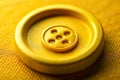Closeup of the Beryllium Symbol on a Bright Yellow Button A Visual Representation of a Chemical Element for Royalty Free Stock Photo