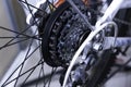 Closeup of a bicycle gears mechanism and chain on the rear wheel of mountain bike. Royalty Free Stock Photo