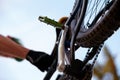 Closeup, bicycle and low angle with wheel, chain and pedal for sport, fitness and workout in nature. Below mountain bike Royalty Free Stock Photo