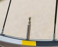 Closeup of bicycle tire valve stem Royalty Free Stock Photo