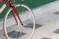 Closeup bicycle wheels on the cement floor