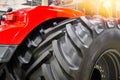 Closeup of big black rubber wheels of an agricultural tractor Royalty Free Stock Photo