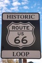 Closeup of a black banner showing the Route in US with the text & x22;Historic Loop& x22; agains the bleu sky