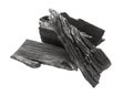 Closeup black charcoal on white background Royalty Free Stock Photo