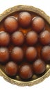 Closeup Black Gulab Jamun, a rich and syrupy delicacy. Royalty Free Stock Photo