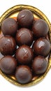 Closeup Black Gulab Jamun, a rich and syrupy delicacy. Royalty Free Stock Photo