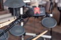 Closeup black iron microphone and cymbals on stage restaurant hall served for banquet. Concept live music concert bar in evening,