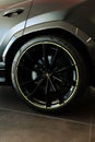 Closeup of black Lamborghini exotic car wheel