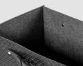 Closeup of black leather woven box with gray felt lining Royalty Free Stock Photo