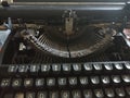 Closeup of black old typewriter on the table. Royalty Free Stock Photo