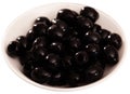 Closeup of Black pitted marinated olives