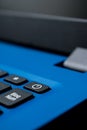 Closeup of a power button on a blue laptop Royalty Free Stock Photo