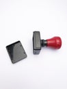 closeup black red plastic stamp Royalty Free Stock Photo