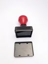 closeup black red plastic stamp Royalty Free Stock Photo