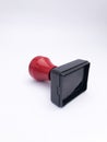 closeup black red plastic stamp Royalty Free Stock Photo