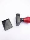 closeup black red plastic stamp Royalty Free Stock Photo
