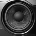 Closeup of a black speaker cone. Royalty Free Stock Photo