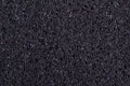 Macro of bubbly black Styrofoam for background Royalty Free Stock Photo