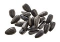 Closeup of black sunflower seeds isolated on white background. Pile of sunflower seeds. Royalty Free Stock Photo