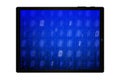 Closeup of a black tablet computer with binary code on blue