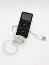 apple ipod nano with charging cable Royalty Free Stock Photo