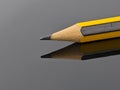 Closeup of black and yellow pencil with reflection Royalty Free Stock Photo