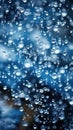 Closeup blend of rain and snow on deep blue backdrop. Inclement autumn winter weather, sleet Royalty Free Stock Photo