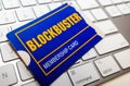 Blockbuster membership card on computer keyboard