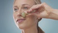 Blonde model during facial treatment routine