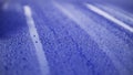 Closeup blue car paint surface with hydrophobic ceramic coating Royalty Free Stock Photo