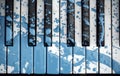 Closeup of blue painted old piano decorated Royalty Free Stock Photo