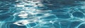 Closeup of Blue Pool Water Showing Sunlight Reflections and Calming Ripples Creating an Abstract Pattern Royalty Free Stock Photo