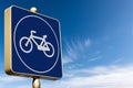 Road Sign of a Bicycle Lane on a Clear Blue sky with Clouds - Photography Royalty Free Stock Photo