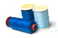 blue sewing thread spool bobbins on white background Royalty Free Stock Photo