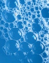 Closeup of Blue Soap Bubbles and Foam Texture Royalty Free Stock Photo