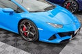 Closeup of a blue sports car Lamborghini standing on the road