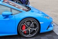 Closeup of a blue sports car Lamborghini standing on the road