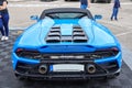 Closeup of a blue sports car Lamborghini standing on the road