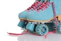 Closeup blue suede roller skates Royalty Free Stock Photo